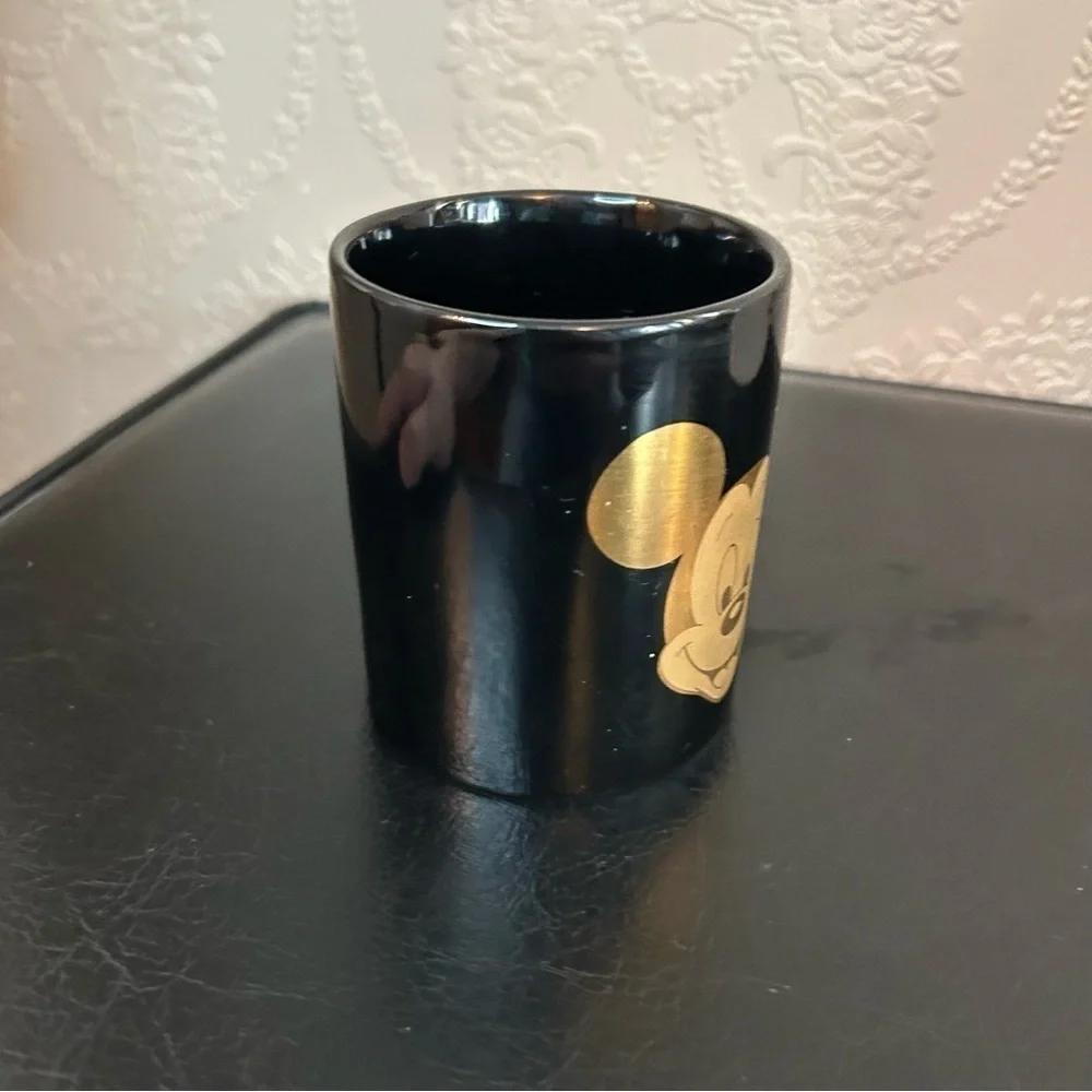 Disney Mickey mug gold black great condition approximately 3.75” high